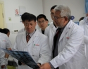 刘健教授与台湾大学附属医院黄胜坚教授共同研究患者的头颅CT
